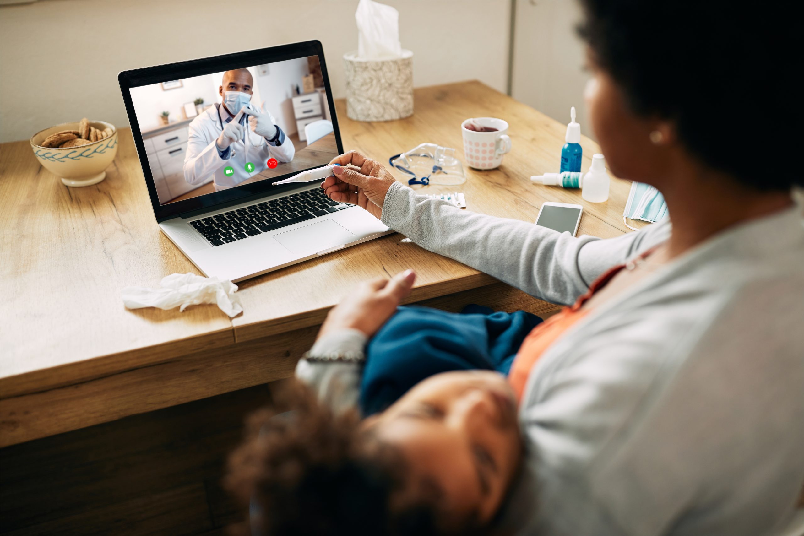 Closeup Mother Having Video Call With Pediatrician While Measuring Daughter S Temperature Home Scaled